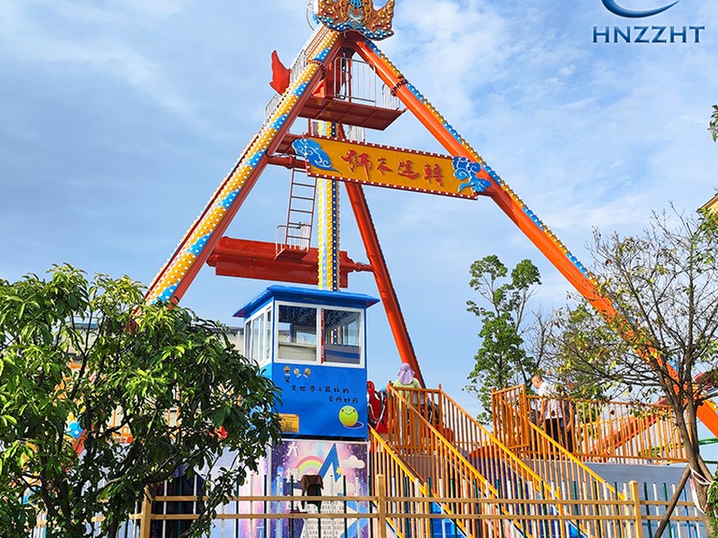 Pendulum swing ride in operation at an amusement park