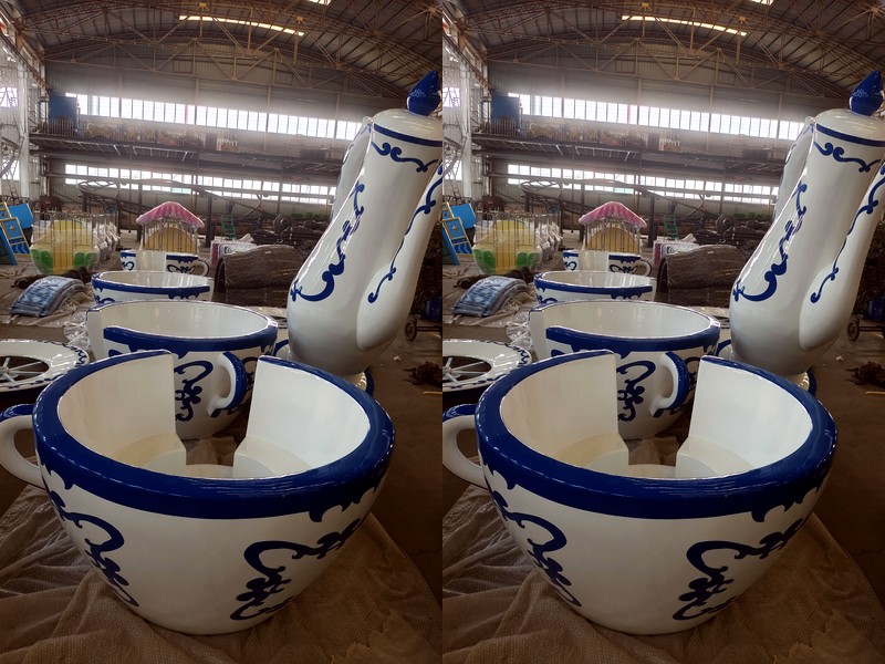Tea cup ride installed with accessible surround